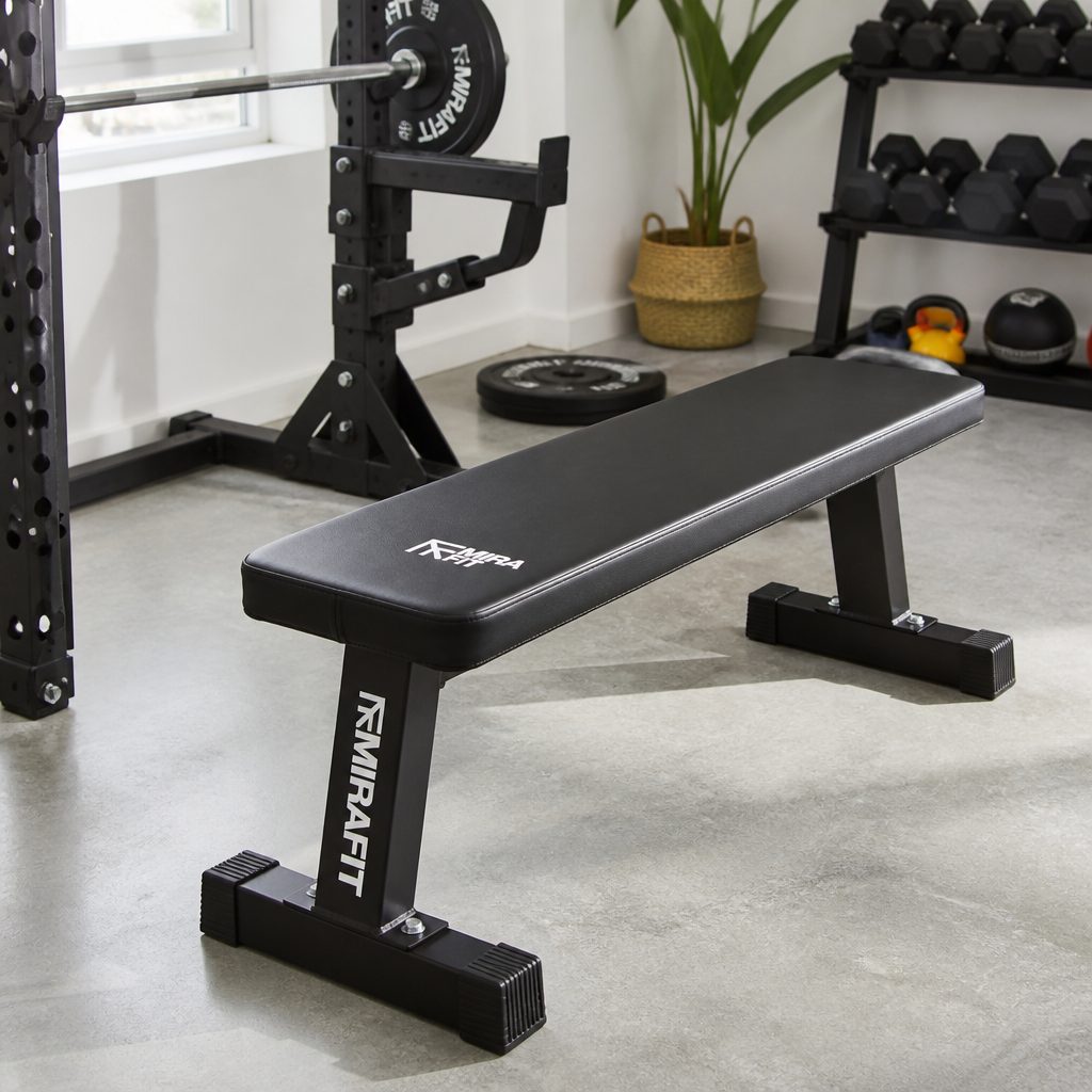 A flat bench is often the most straightforward route into dumbbell pressing, supported rows, split squats and core work.