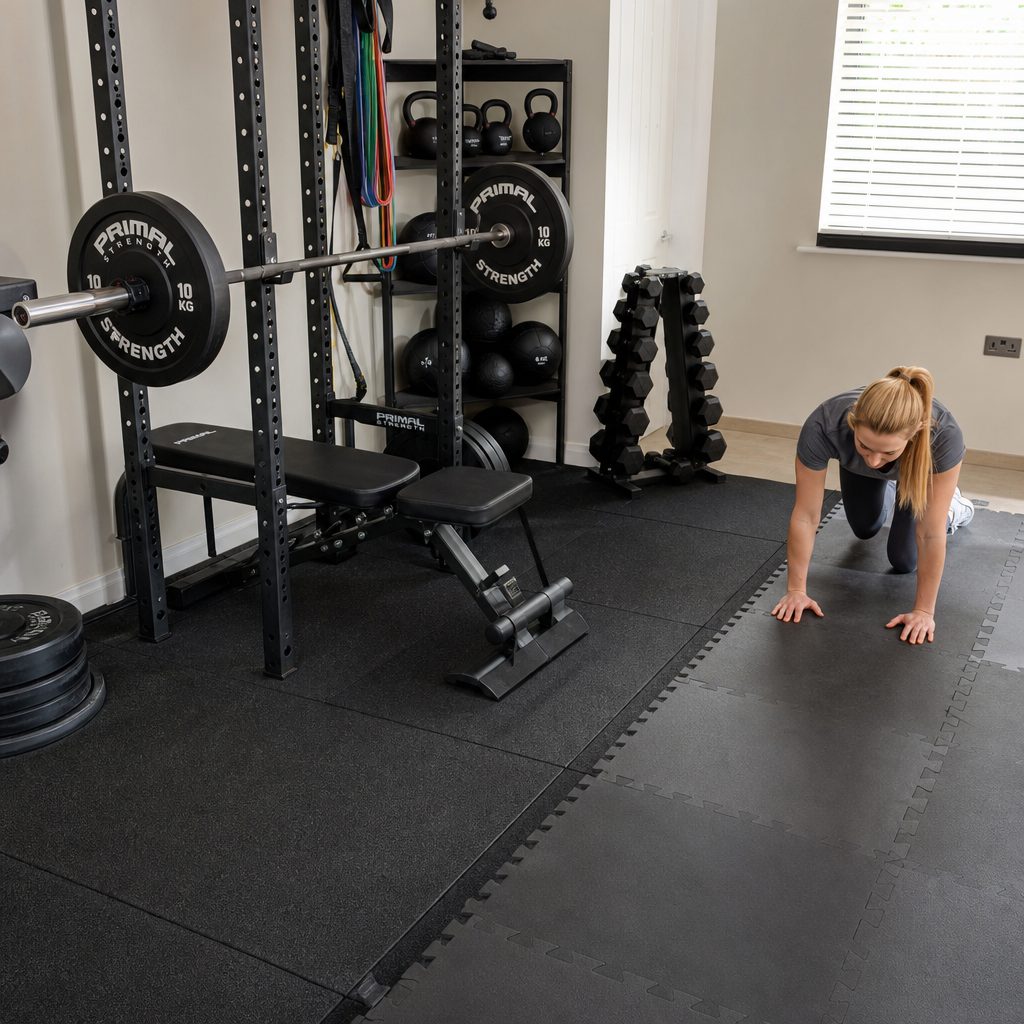 A dedicated lifting area benefits from dense rubber beneath the barbell, rack and bench. Soft foam is more at home where the work involves moving your body rather than repeatedly loading the floor.